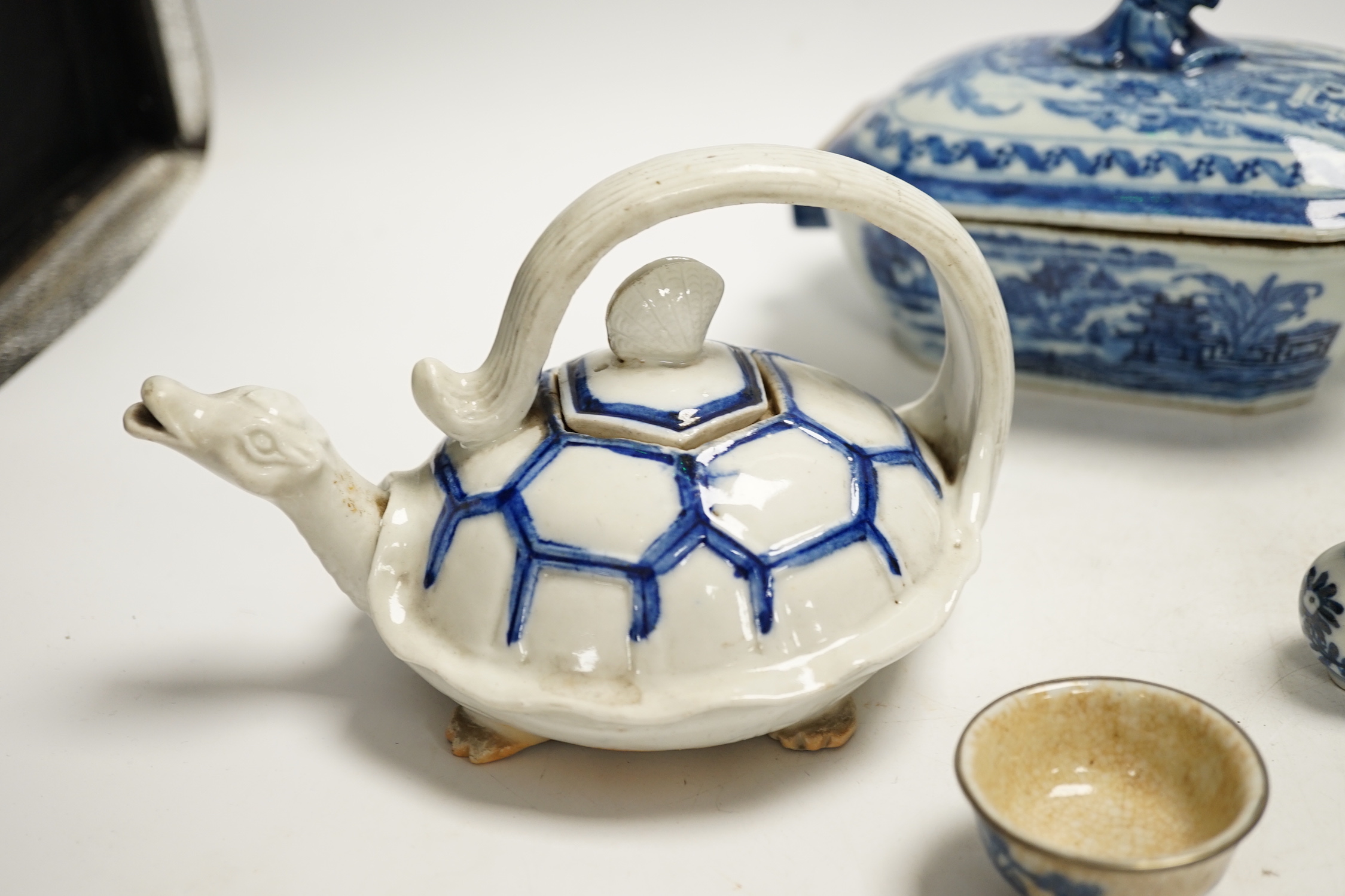 A Japanese Hirado ‘turtle’ teapot, an 18th century Chinese blue and white tureen and cover, an early 20th century jar and cover, teapot and various small vases, covers etc.